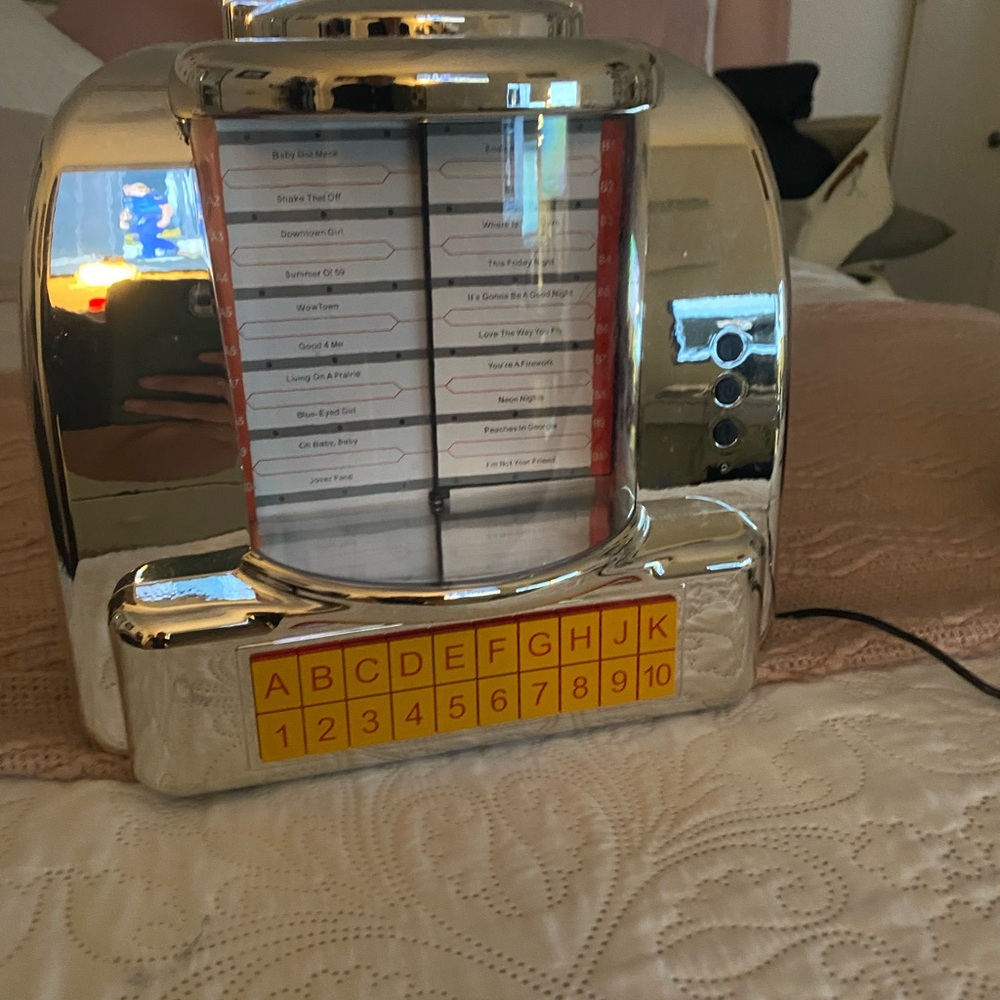 Retro Silver Jukebox with Red Accents